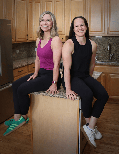 gwen and sheena sitting on box